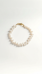 Pulsera de perlas ovaladas onduladas